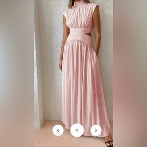 Beautiful Commense pink dress with high neck and cutout sides